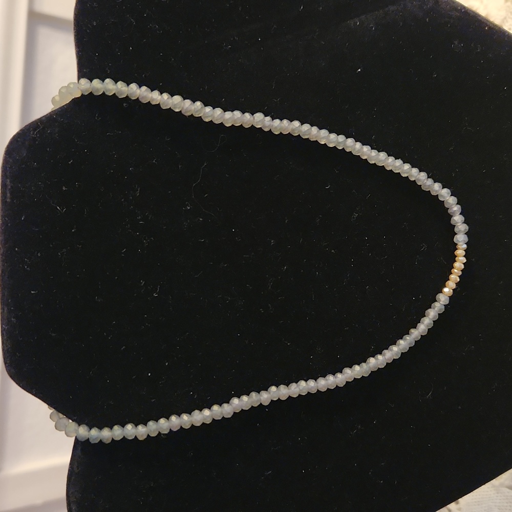 Necklace, great condition,  green, assorted size beads. Unique clasp, 7 inches